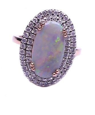 Lot 309 - Opal and Diamond, Double Halo Ring.