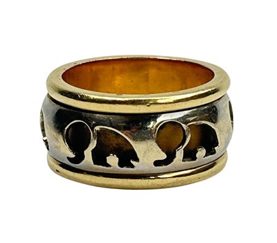 Lot 126 - Yellow and White Gold Band.
