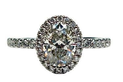 Lot 120 - Oval Shape Diamond Ring.