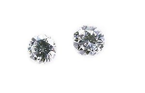 Lot 165 - Two White Diamonds.