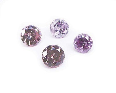 Lot 164 - Four Pink Diamonds.